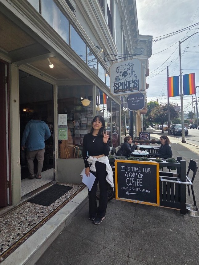 Lulu outside Spike's Coffee and Tea in the Castro
